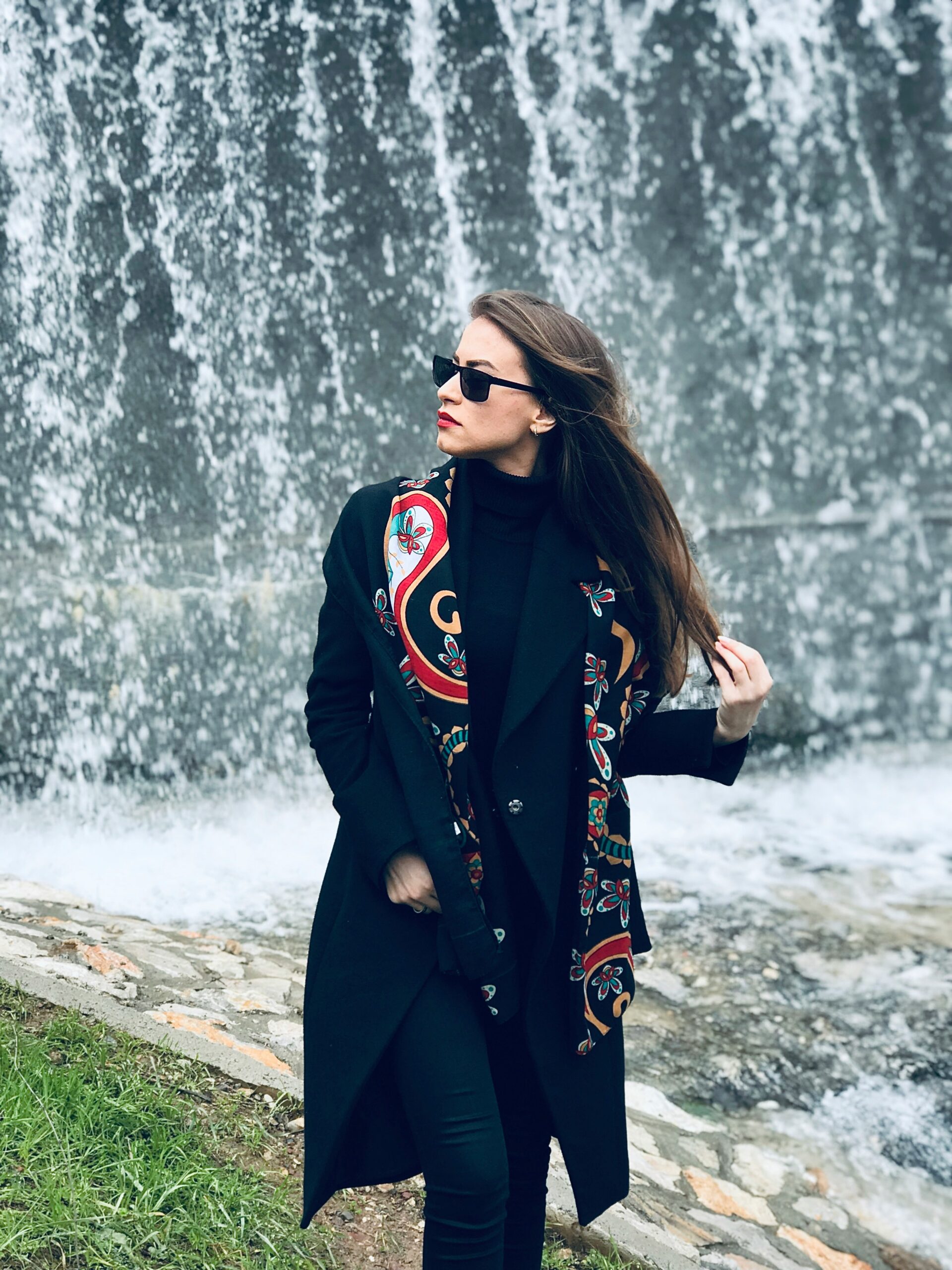 woman in black overcoat